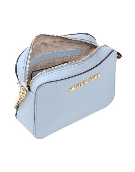 mk blue crossbody bag.